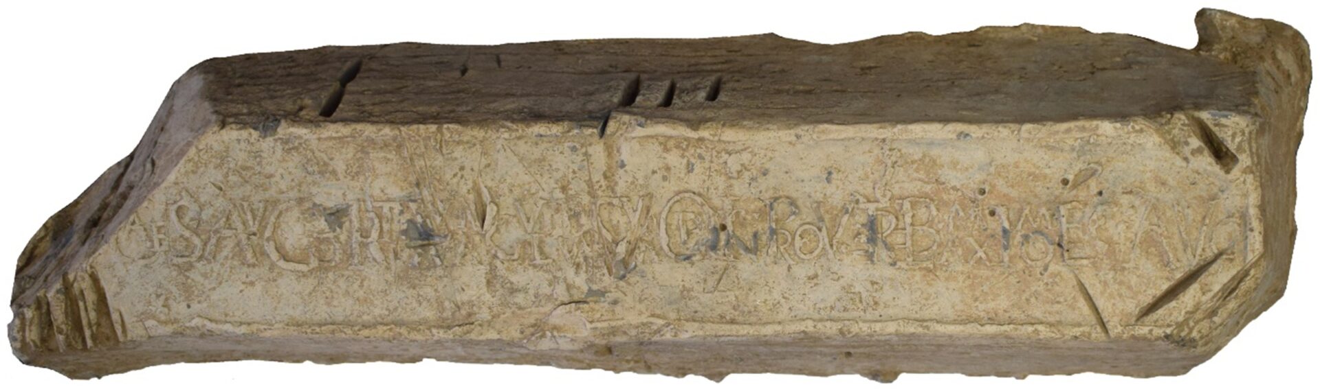 Block of a whitish-looking substance, engraved with Latin characters